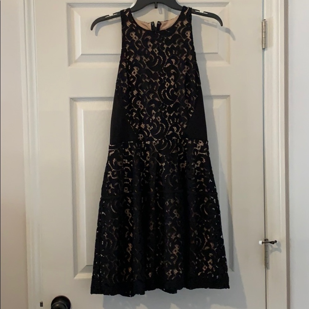 Black lace over nude dress